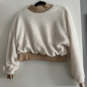 Cream and tan cropped fabletics sweater